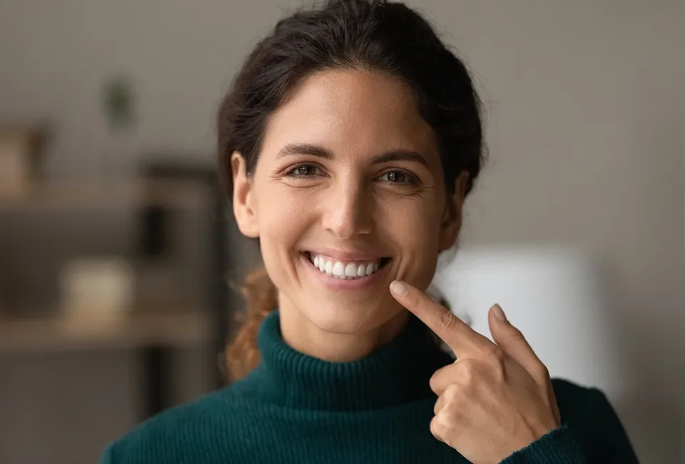 Patient showing her new smile